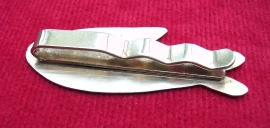 Back of fish tie plate showing clip